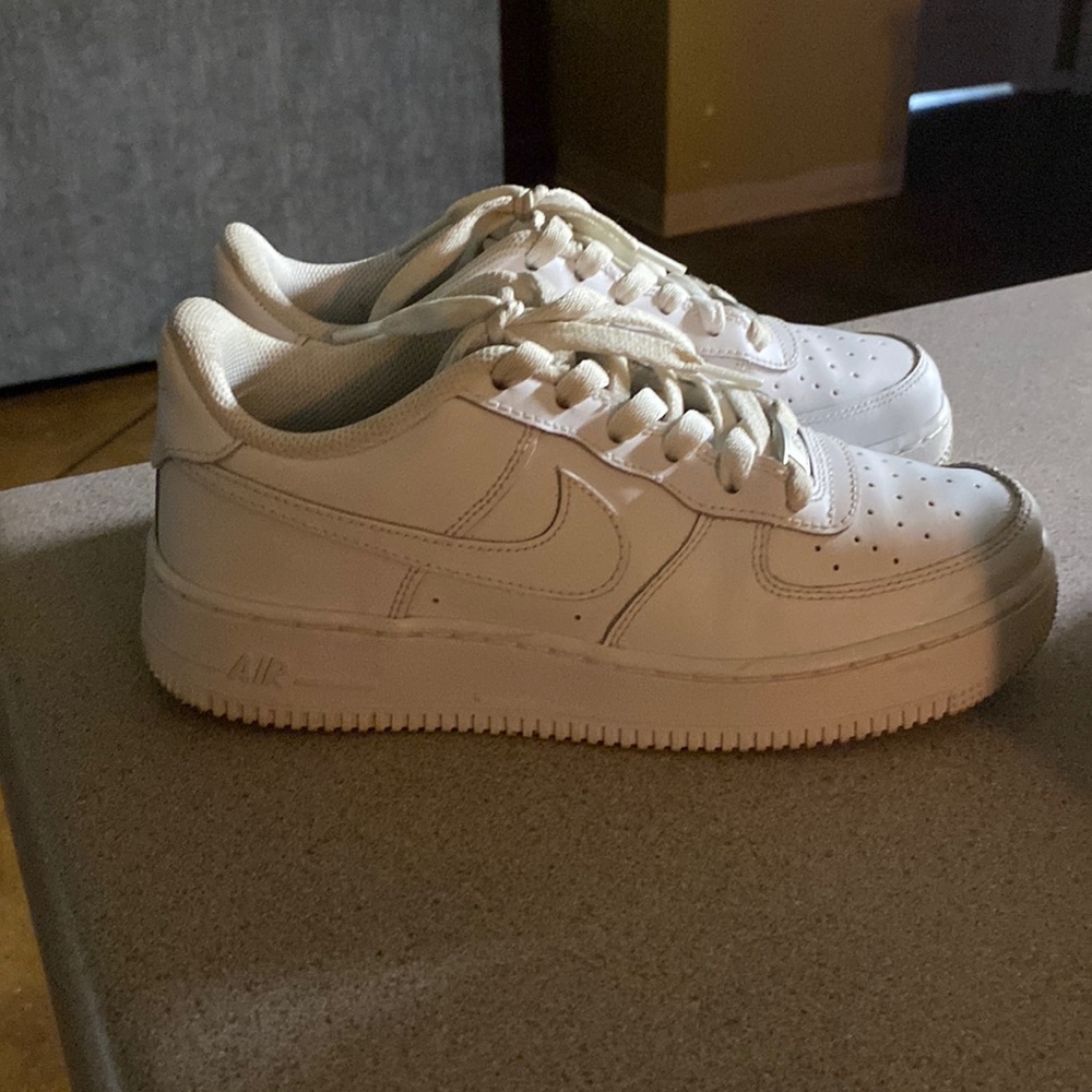 Size 5.5 nike Air Forces worn only a handful of times. Still look new.
